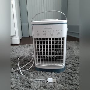 Light weight, portable air cooling fan.